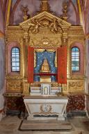 Ensemble de l'autel secondaire de saint Ferréol : degré d'autel, autel, tabernacle, gradins d'autel, retable, deux vantaux, buste-reliquaire (saint Ferréol), châsse