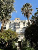 maison de villégiature (villa balnéaire), dite Villa Poulain, puis Le campanile, puis Villa Turquoise, puis hôtel de voyageurs dit des orangers, actuellement immeuble dit Palais les orangers