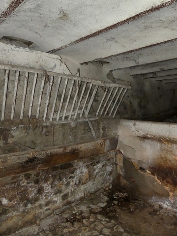 Bâtiment de la grange-étable. Etage de soubassement, étable centre-ouest. Mur ouest.