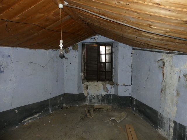 Etage de comble, chambre sud. Vue de volume prise du nord.