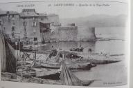 Vue du port de la Ponche avec sa cale de halage au centre et la Tour Vieille en arrière-plan, au début du 20e siècle.