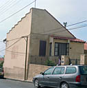 Mur-pignon et façade arrière.