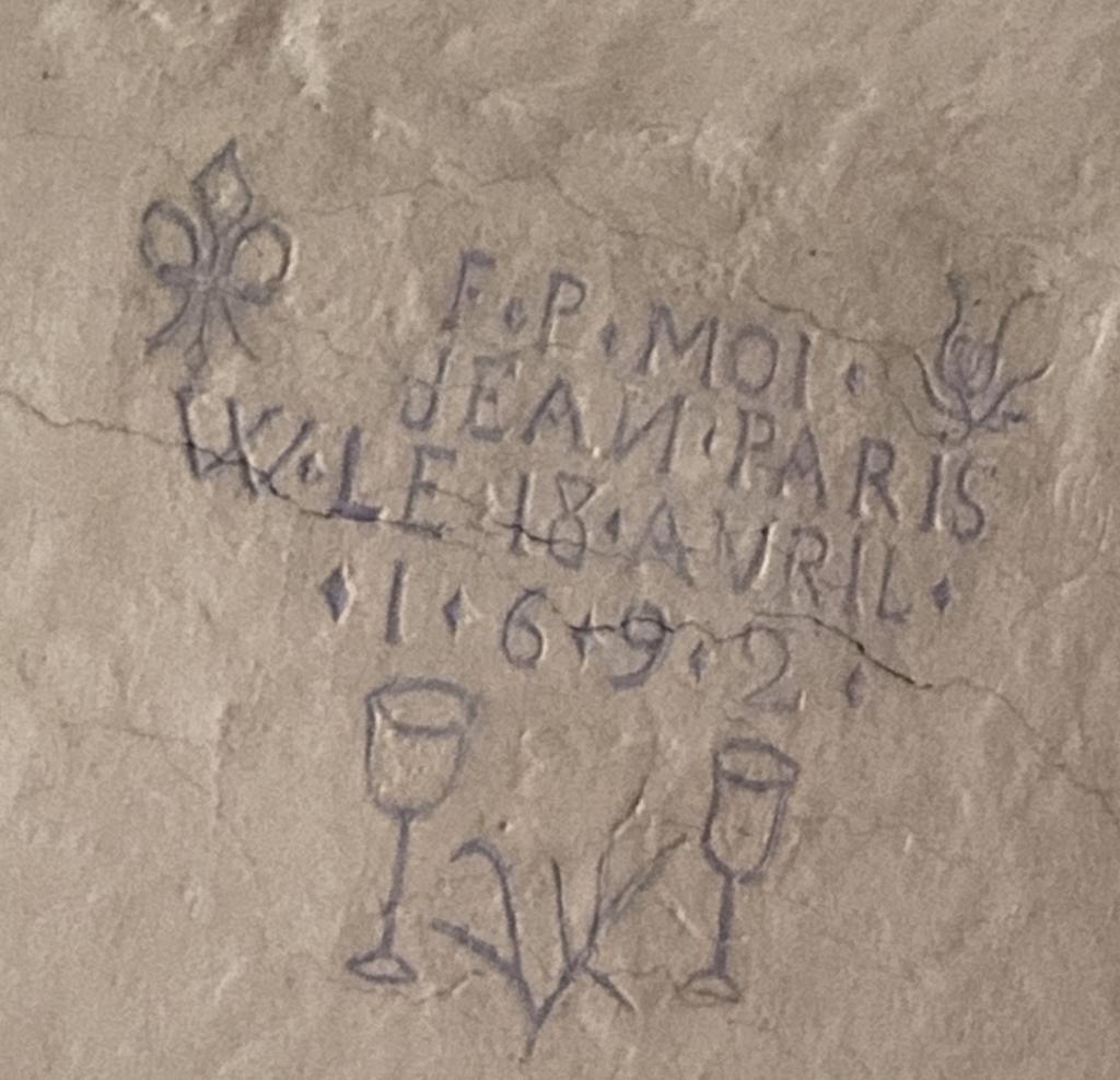 Signature apposée sur la voûte de la nef.