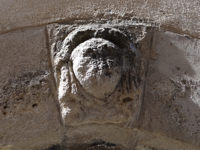 Porte de logis, détail d'un mascaron à figure anthropomorphe (C1 192).